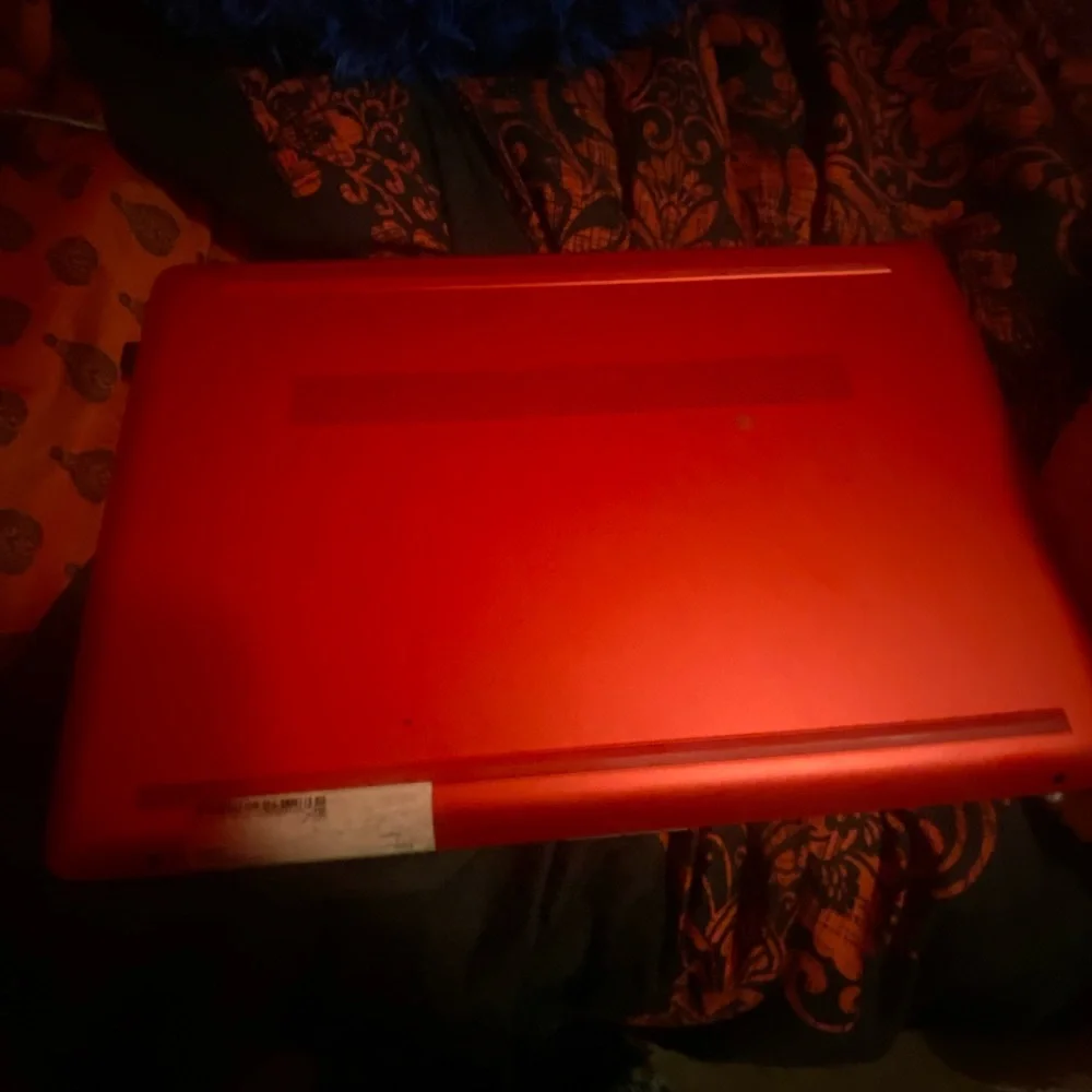 Red HP laptop